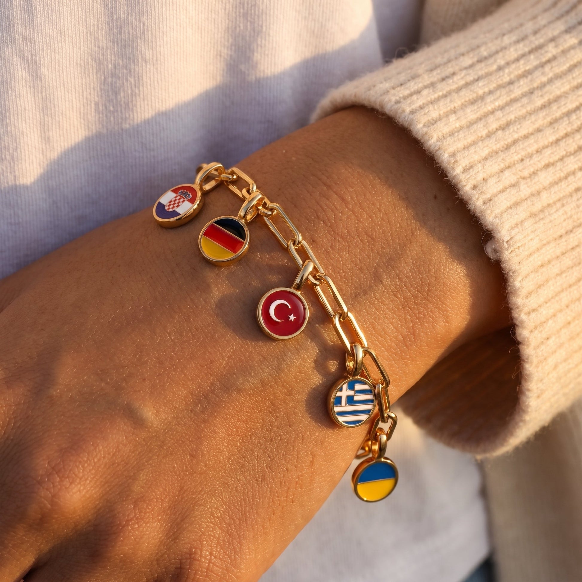 Armband med Landscharms – Guld
